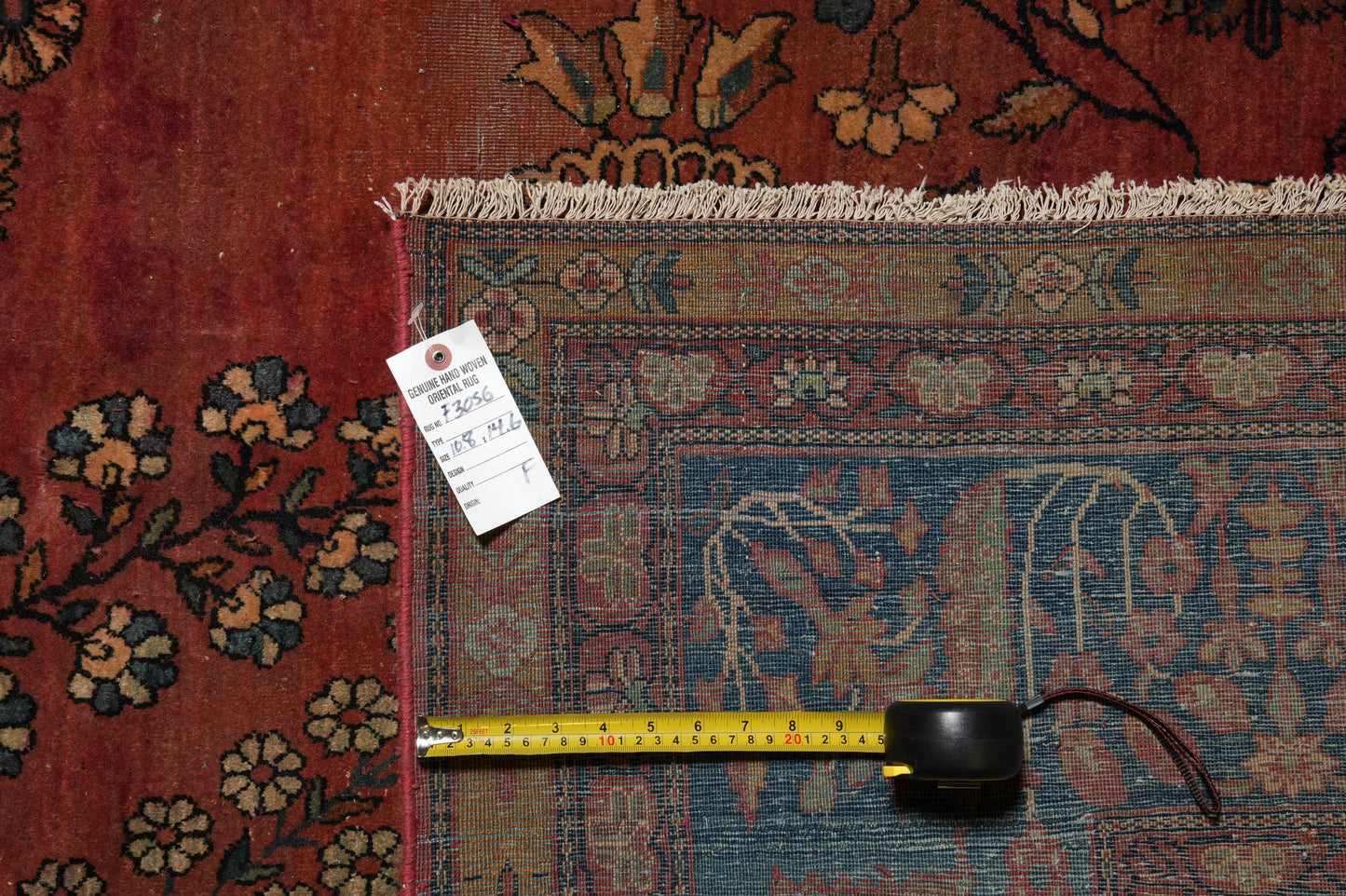 Antique Kashan-style rug, environment shot showing palace-room scale