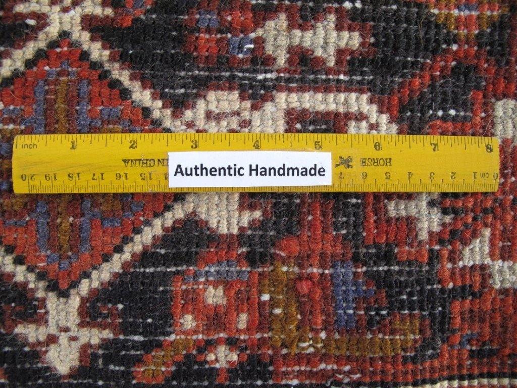 Classic Heriz-style wool rug, edge and selvedge detail