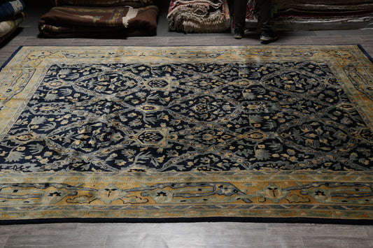 Nepali dark blue rug, central motif close-up in gold and ivory