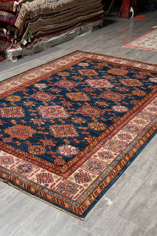 Silky navy Super Kazak rug, central medallion close-up