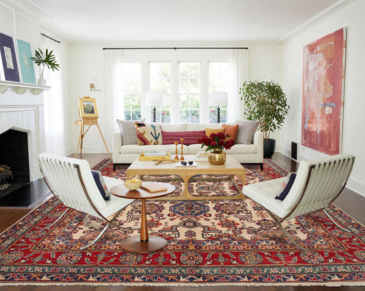 Afghan Kazak ivory rug, central medallion close-up in red and navy