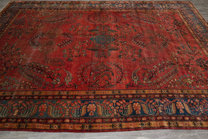 Antique Kashan-style rug, central medallion close-up showing curvilinear floral detail