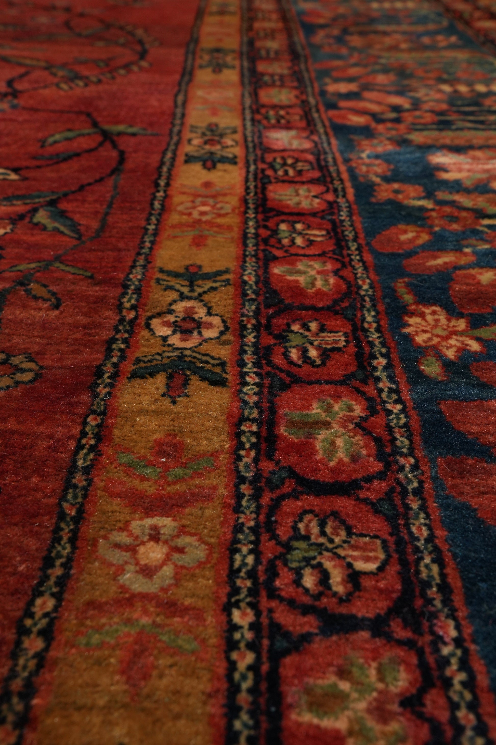 Antique Kashan-style rug, secondary floral motif close-up