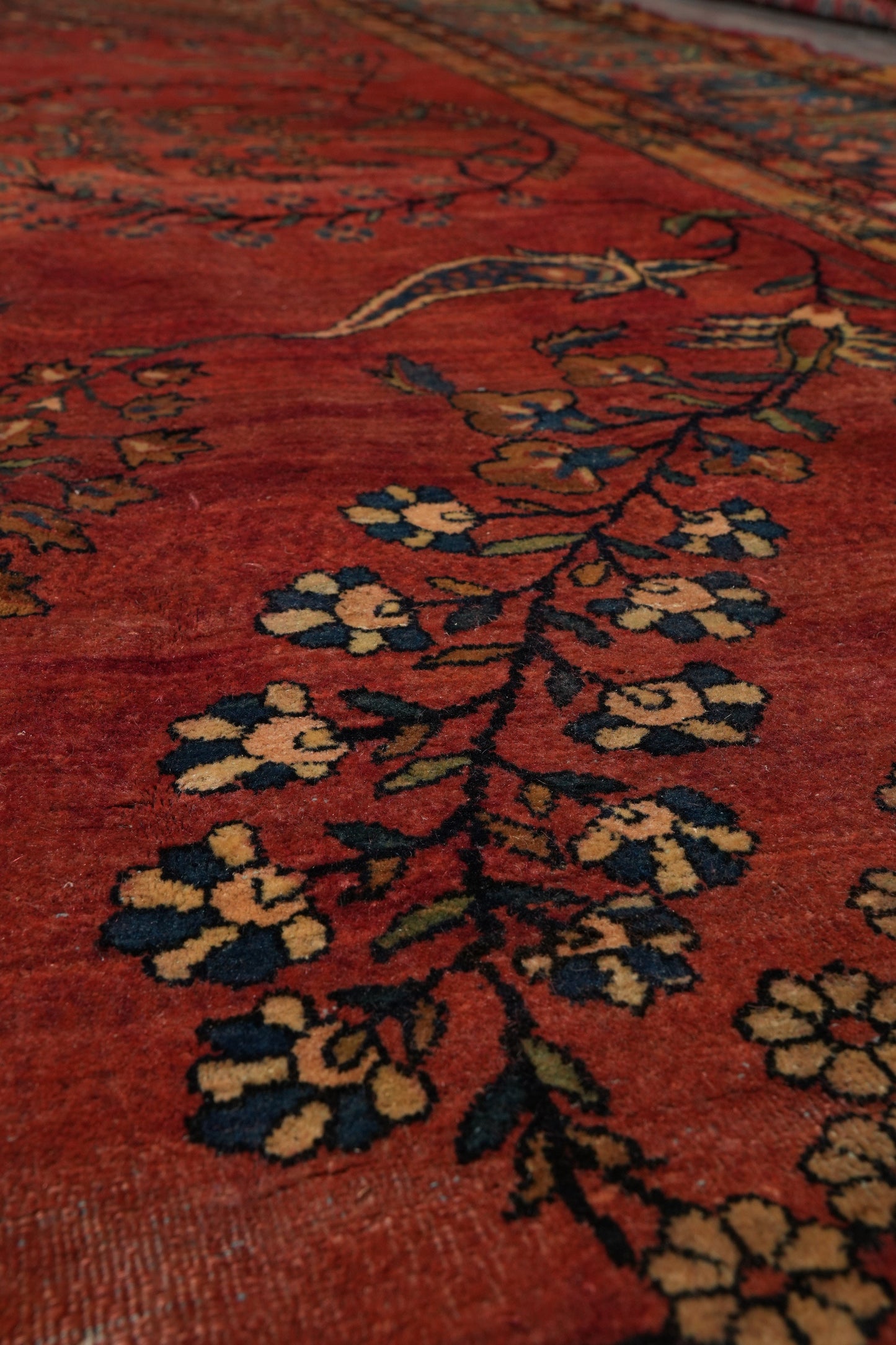 Antique Kashan-style rug, pile texture detail showing aged wool depth
