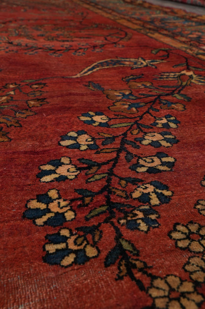 Antique Kashan-style rug, pile texture detail showing aged wool depth