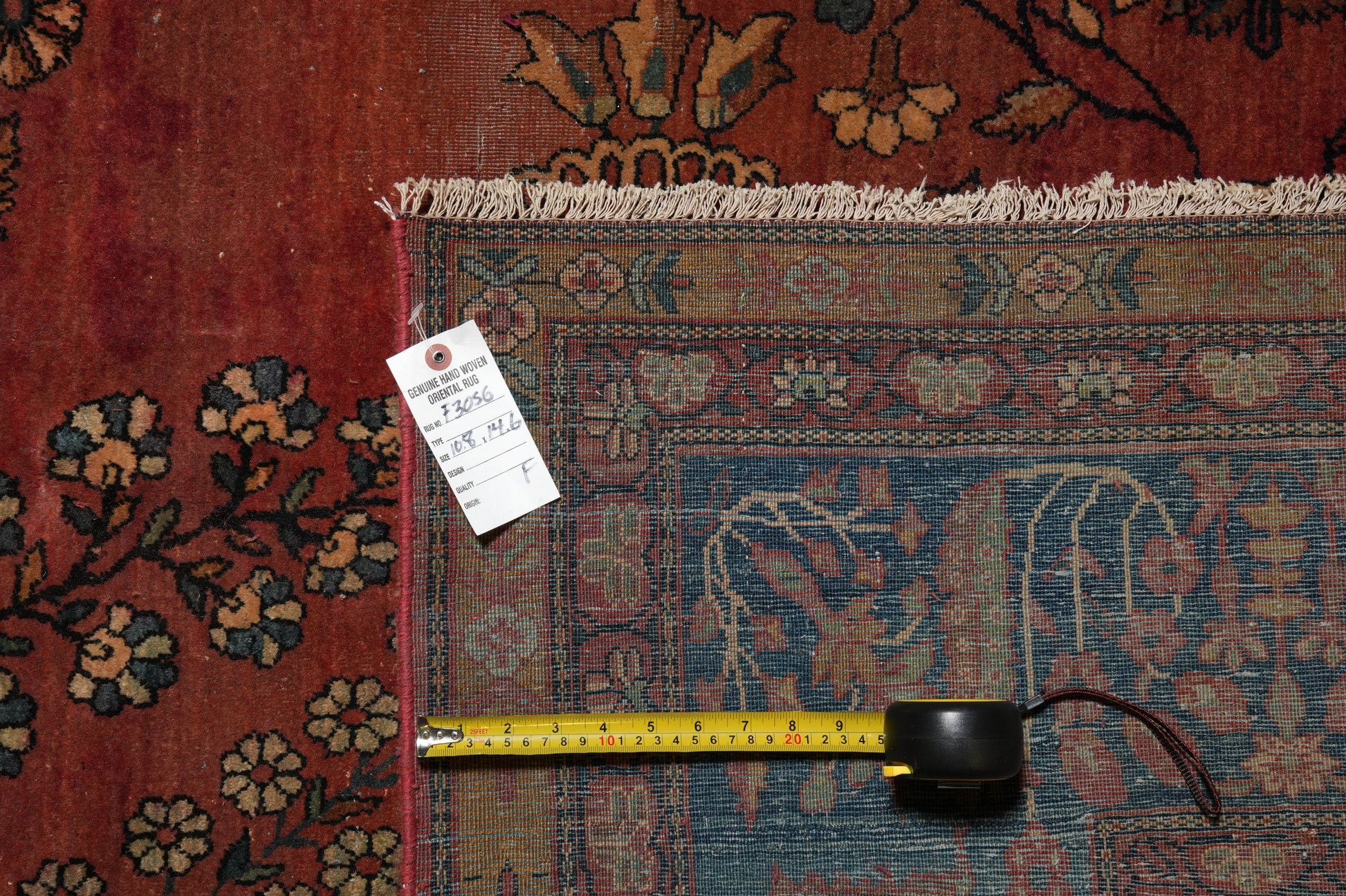 Antique Kashan-style rug, environment shot showing palace-room scale