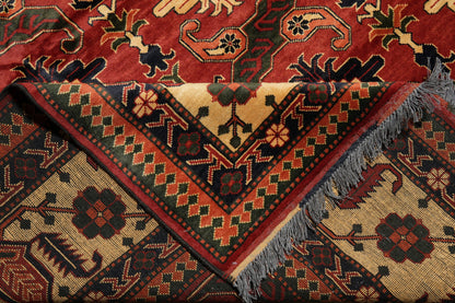 Afghan Shirvan-Kargahi Kazak rug, secondary medallion in navy and rust