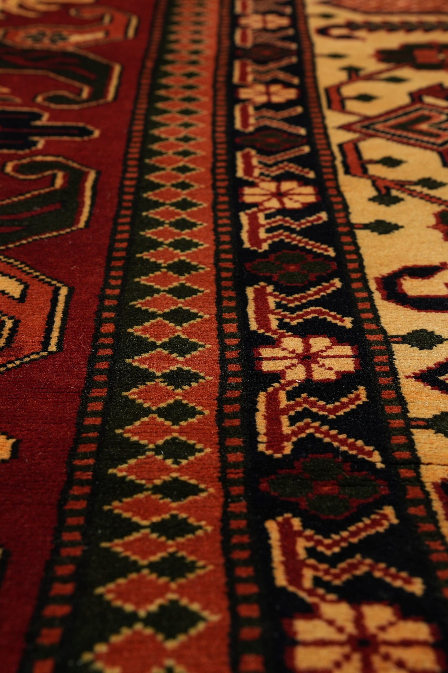 Afghan Shirvan-Kargahi Kazak rug, color balance close-up showing multi-color field