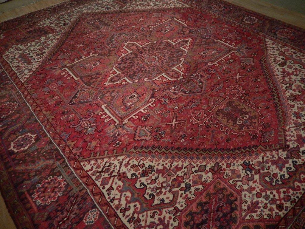 Semi-antique Heriz-style wool rug, geometric corner detail showing tribal motifs