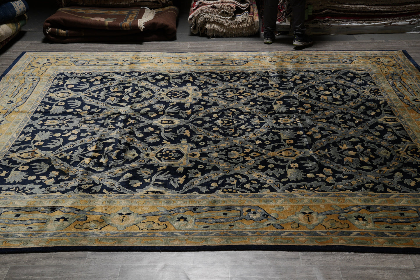 Nepali dark blue rug, central motif close-up in gold and ivory