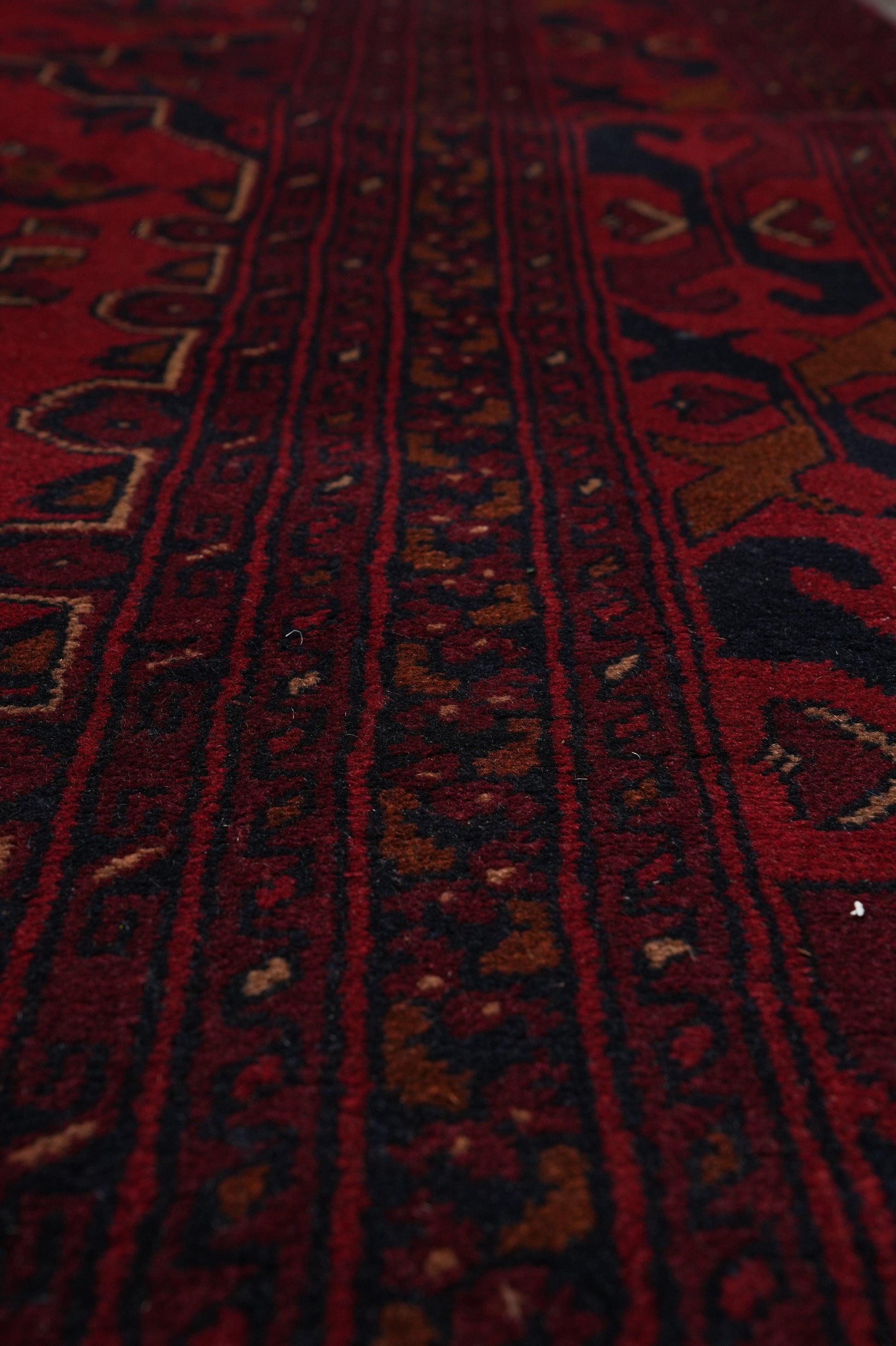 Afghan Khal Mammadi oversize rug, color balance close-up showing dark red field