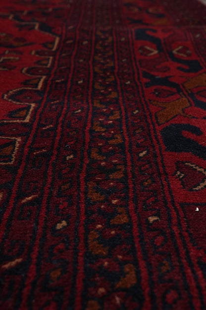 Afghan Khal Mammadi oversize rug, color balance close-up showing dark red field