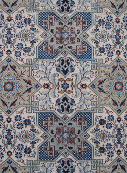 Signed Kashan-style ivory rug, weaver signature panel close-up