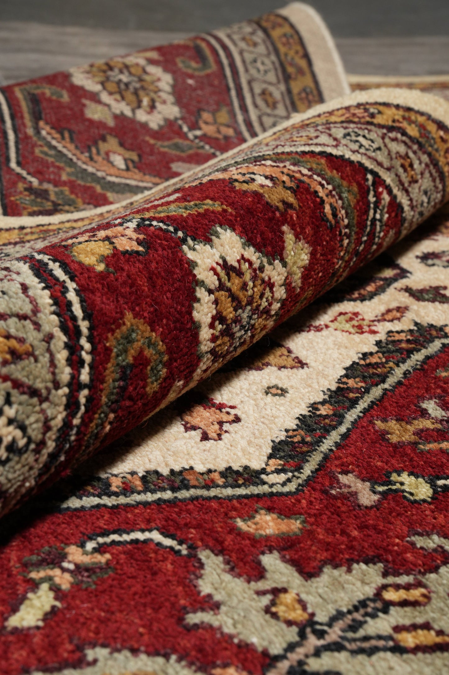Heriz-Serapi-style wool rug, pile texture close-up showing wool depth