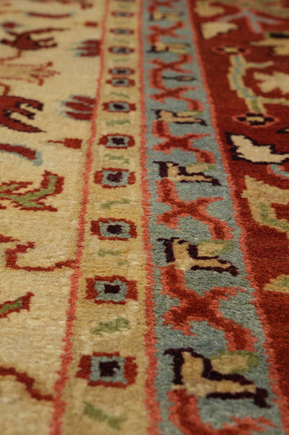 Ziegler rug, color balance close-up of ivory field with coral accents