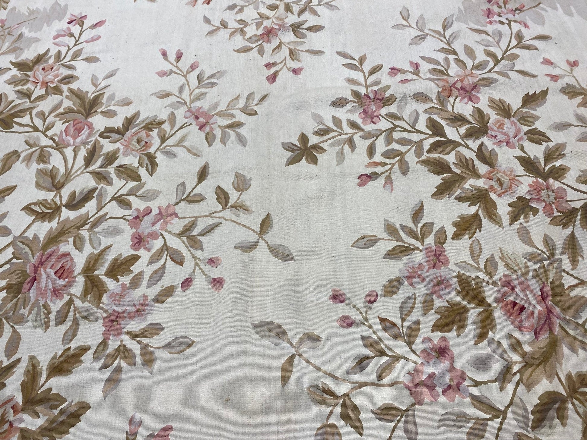 Aubusson floral rug, weave texture showing wool flat-weave construction
