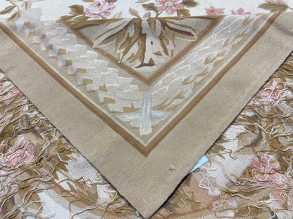 Aubusson floral rug, partial overhead view in natural light