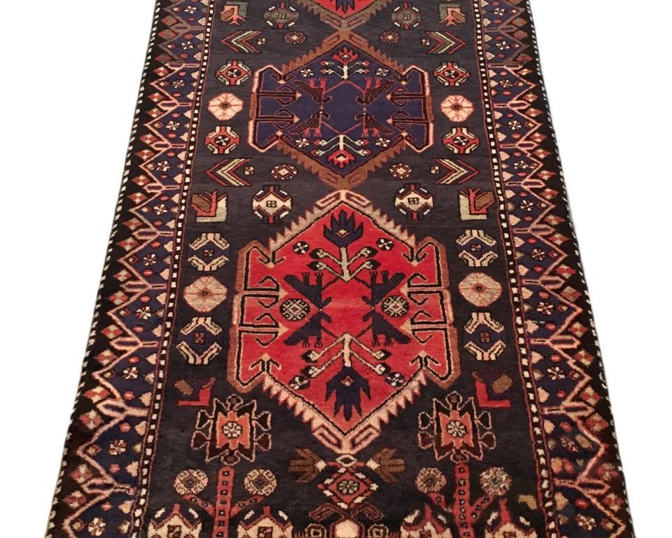 Hamadan-style multi runner, mid-length pattern showing tribal motifs