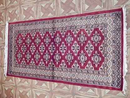 Jaldar Bokhara small rug, ivory border close-up
