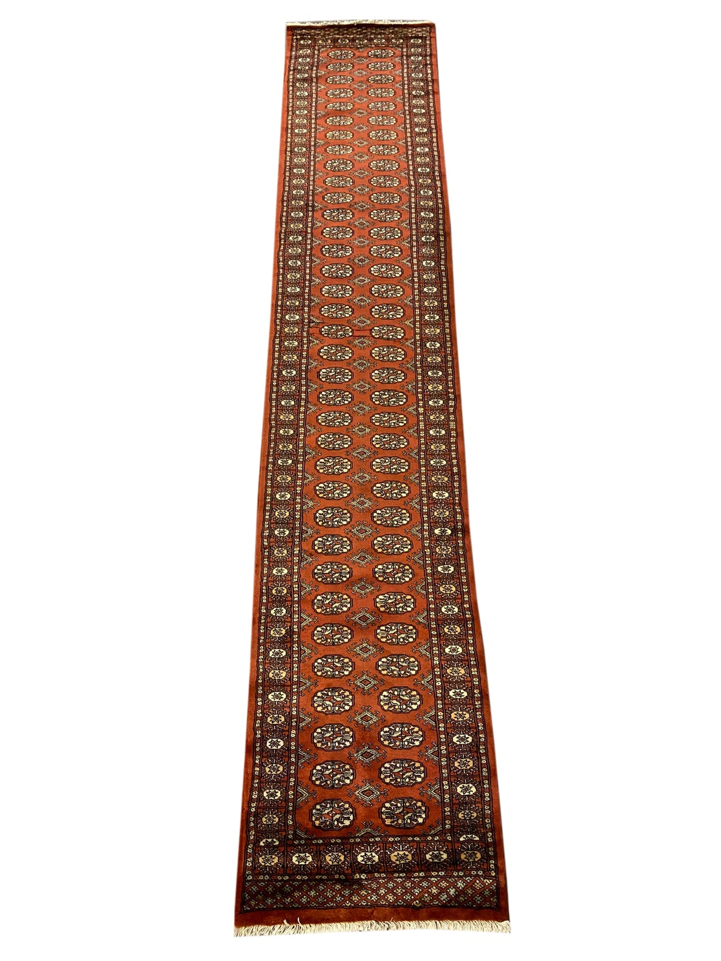 Bokhara long runner, opening section with repeating gul medallions