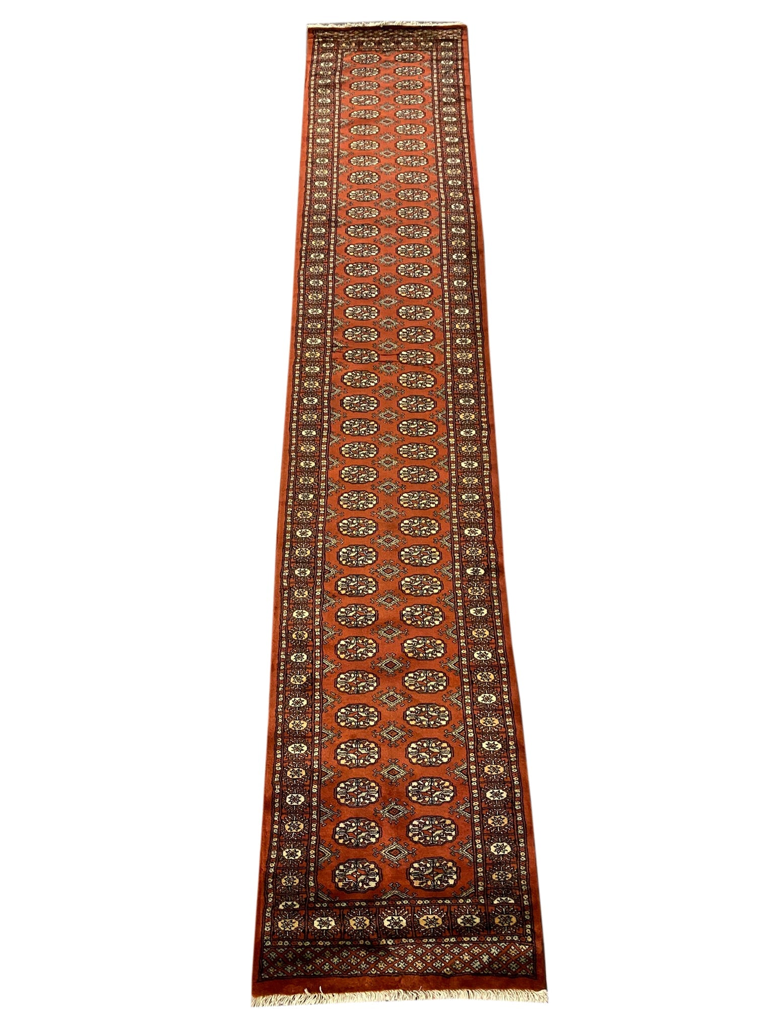 Bokhara long runner, opening section with repeating gul medallions