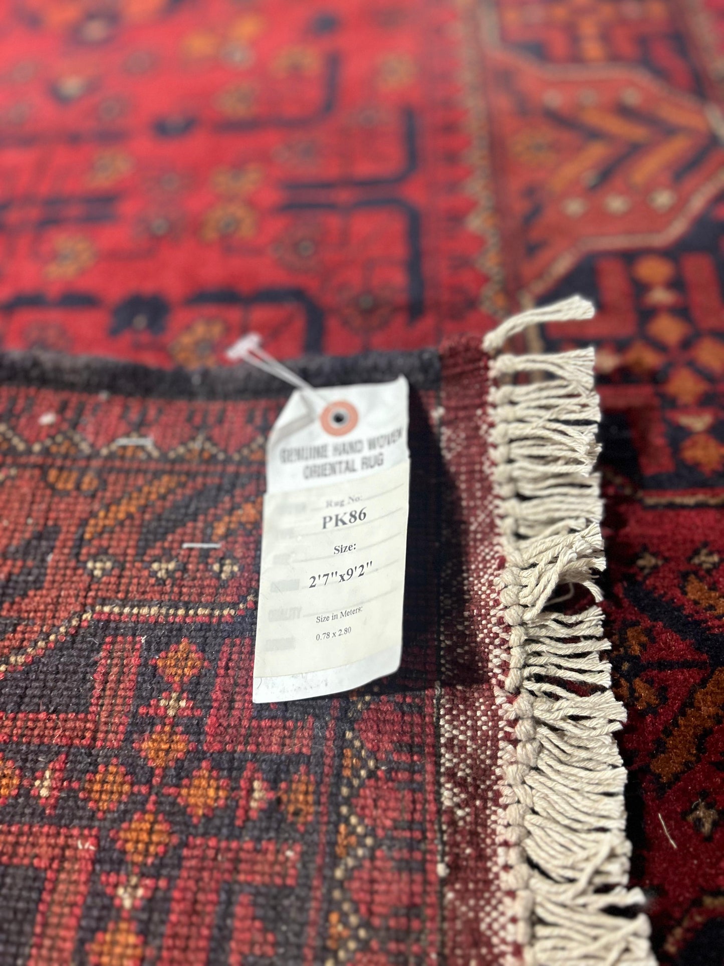 Afghan tribal runner, full-length view at an alternate angle