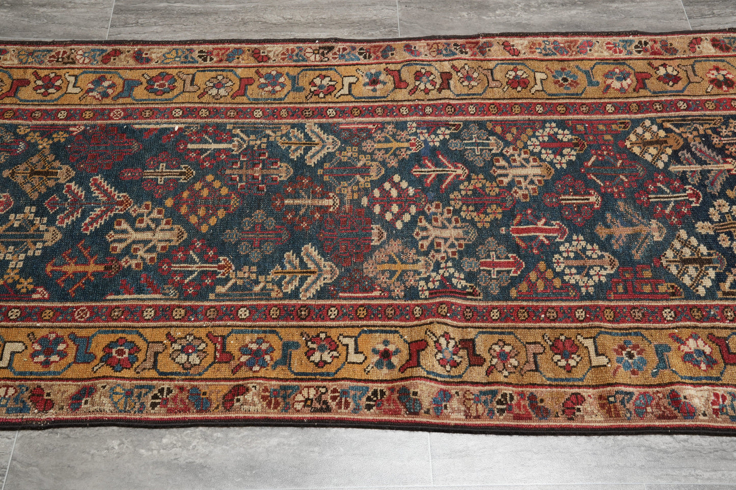 Antique 1940s Joshagan-pattern runner, mid-length tribal motif detail