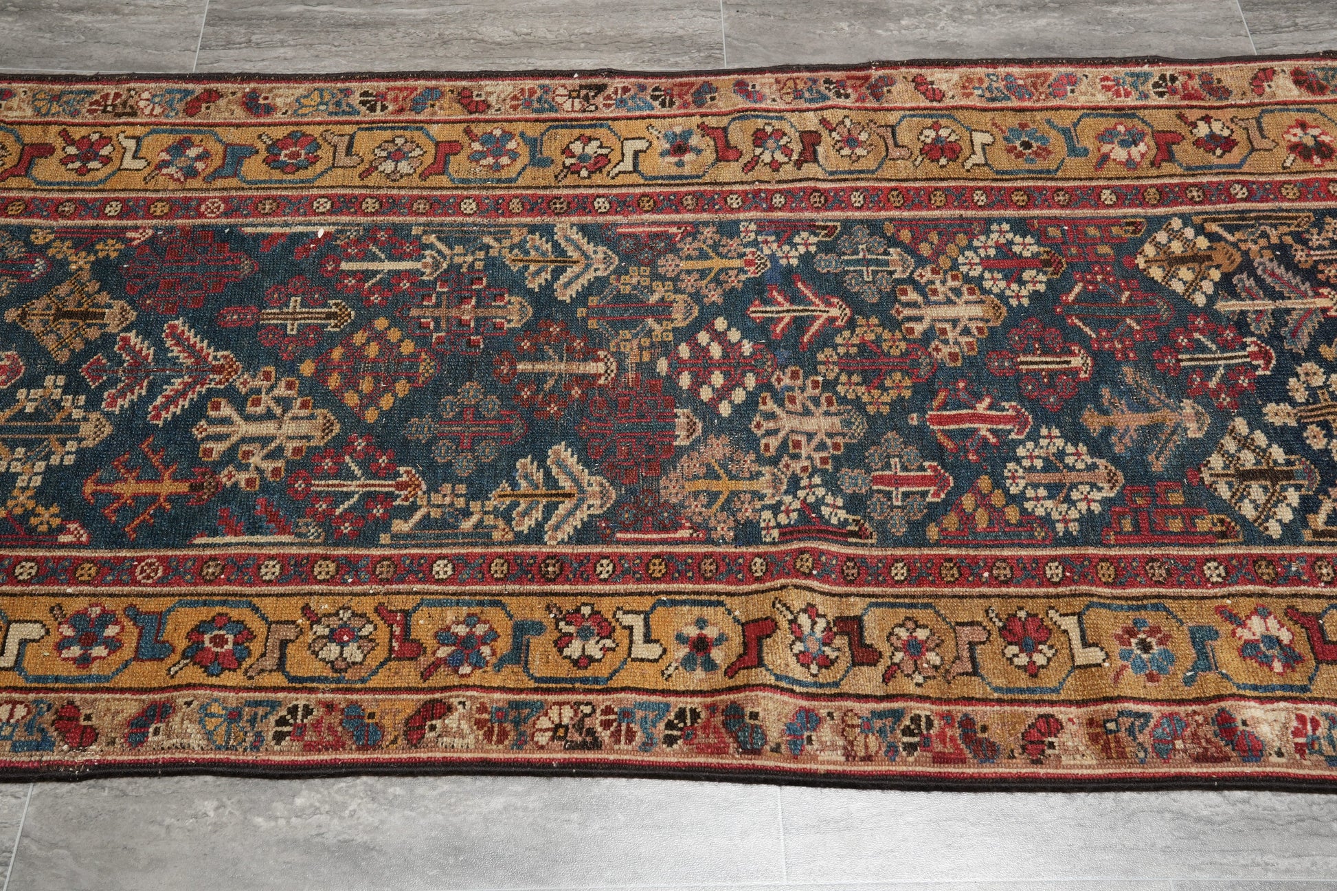 Antique 1940s Joshagan-pattern runner, mid-length tribal motif detail