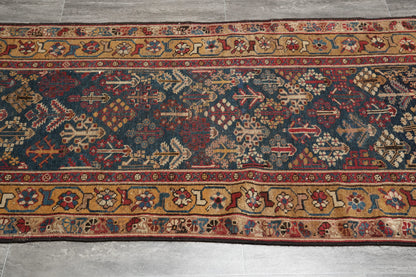Antique 1940s Joshagan-pattern runner, mid-length tribal motif detail