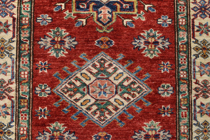 Super Kazak runner, border pattern detail in red and ivory