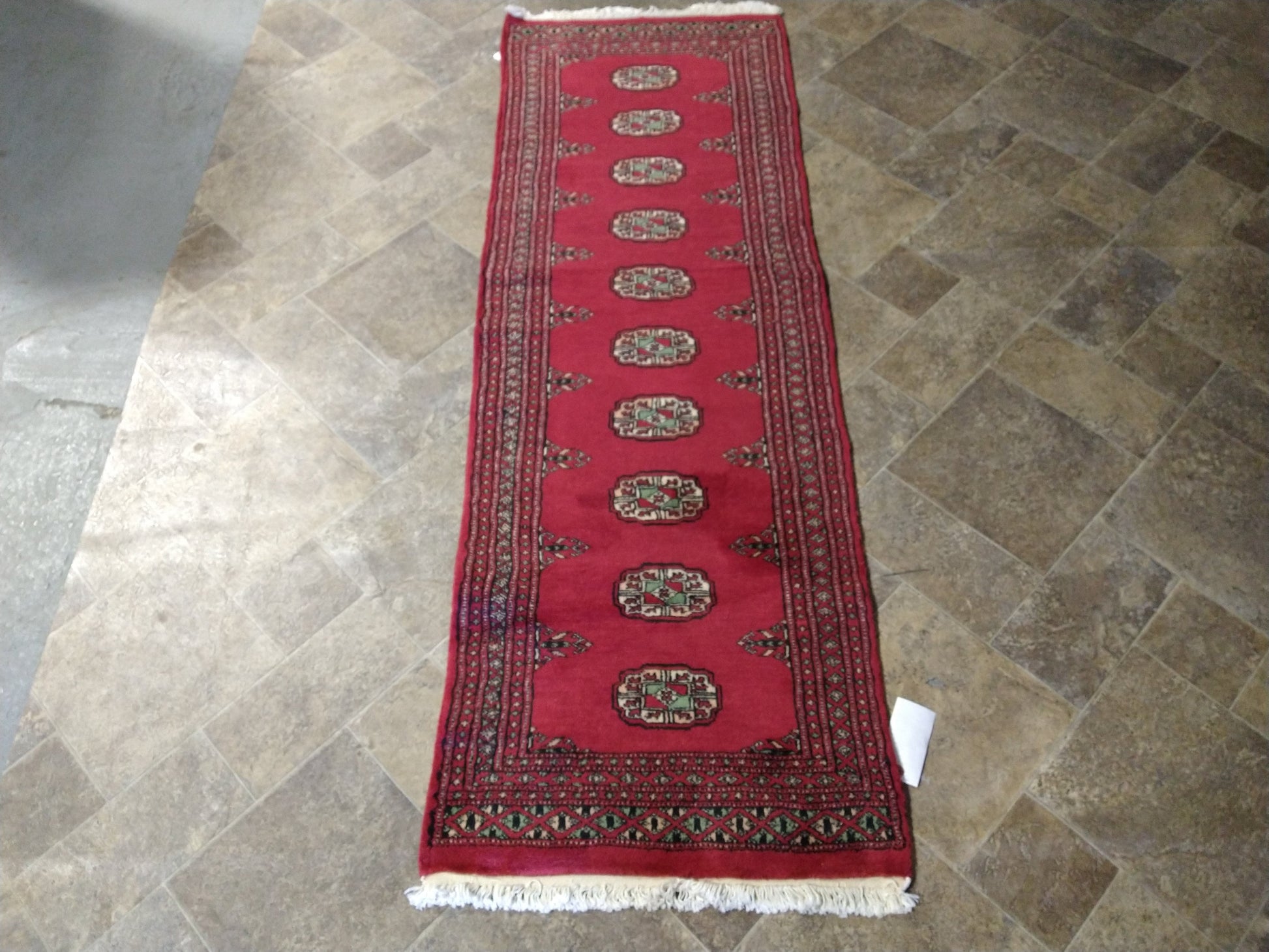 Bokhara runner, repeating gul medallion close-up