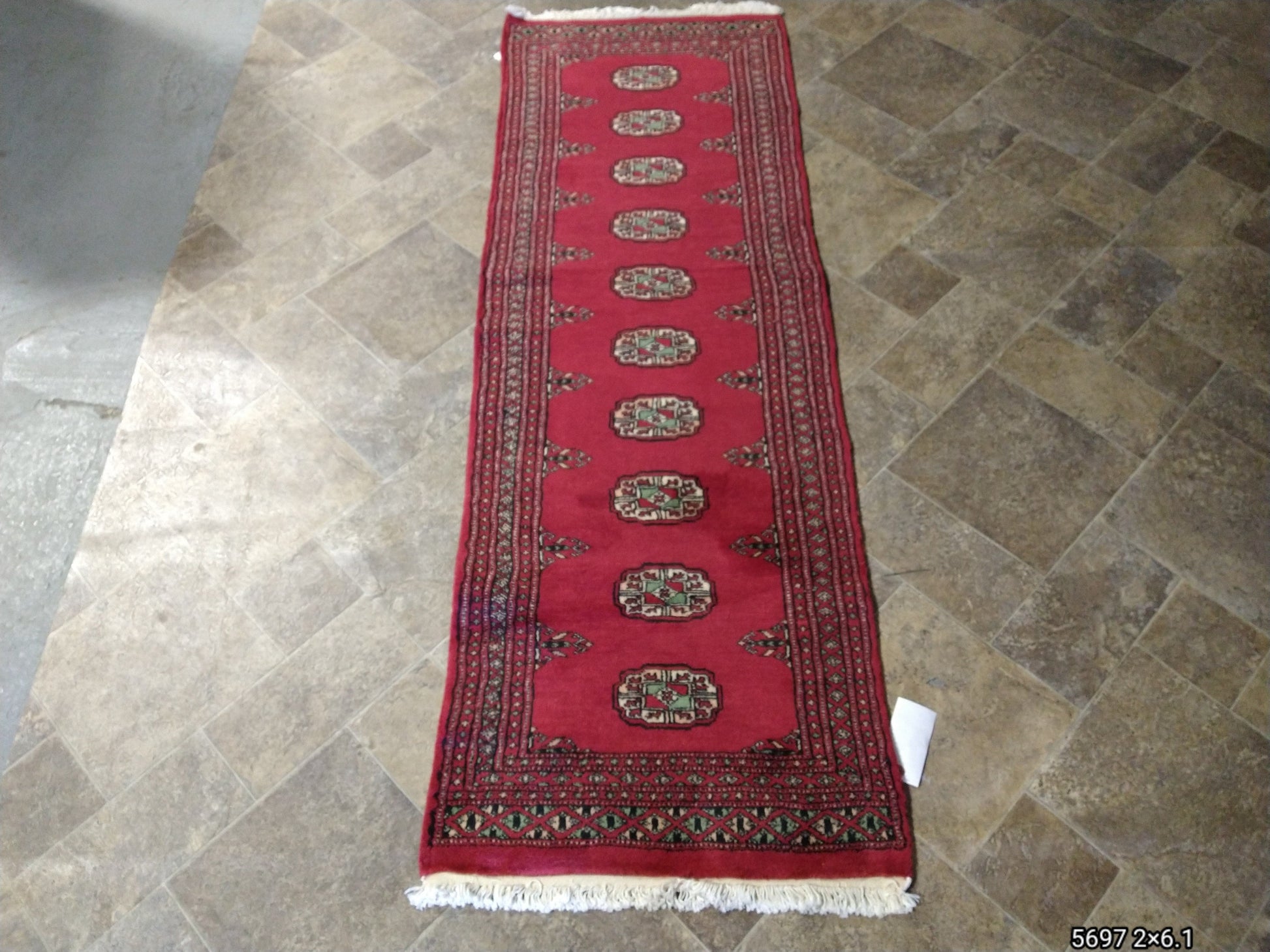 Bokhara runner, mid-length pattern showing repeating motifs