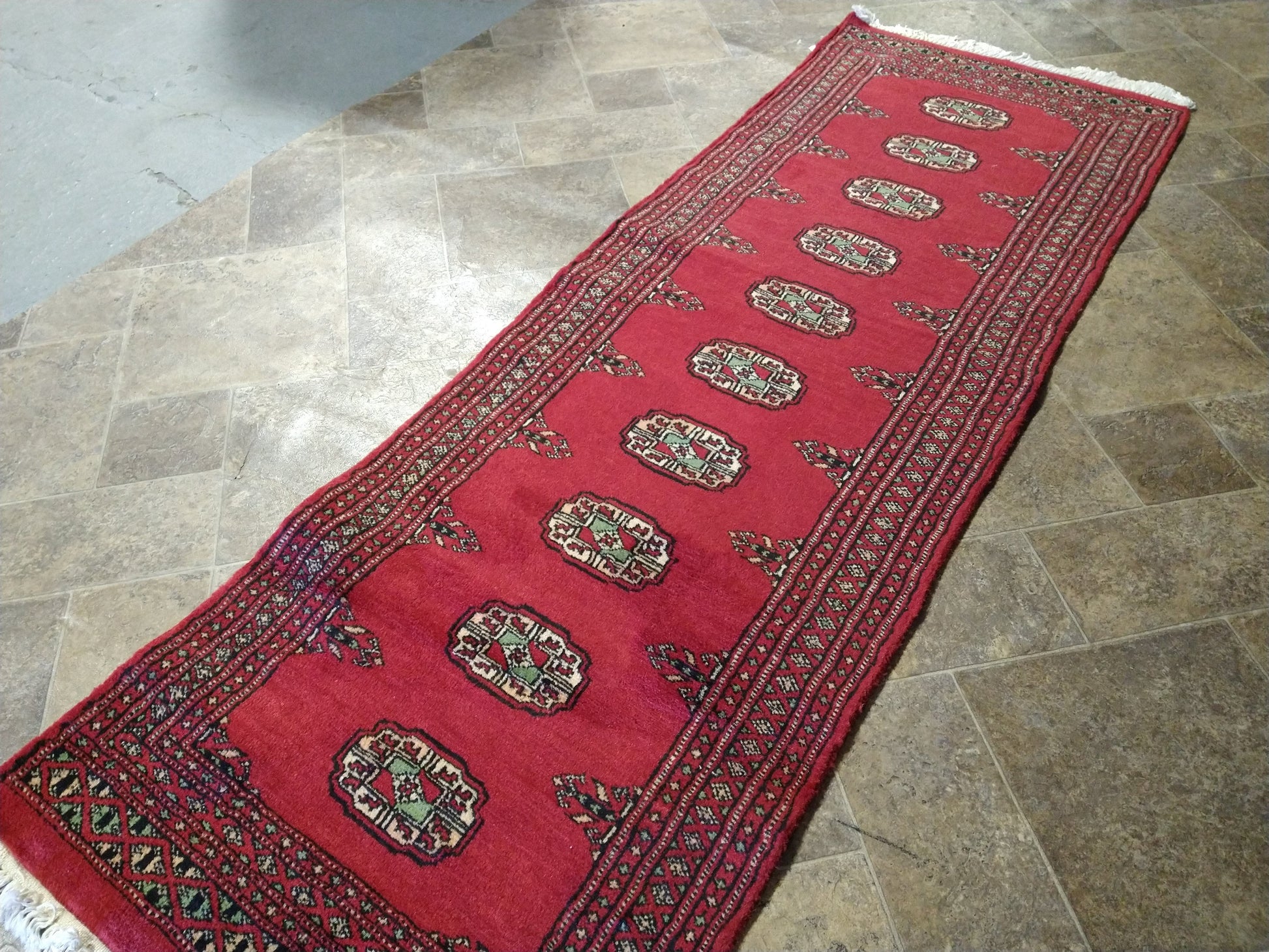 Bokhara runner, ivory border pattern detail