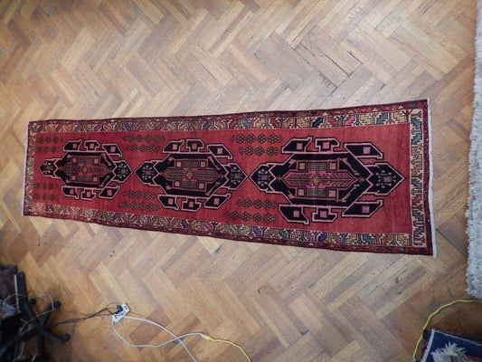 Semi-antique navy Hamadan-style runner, central medallion detail in ivory and red