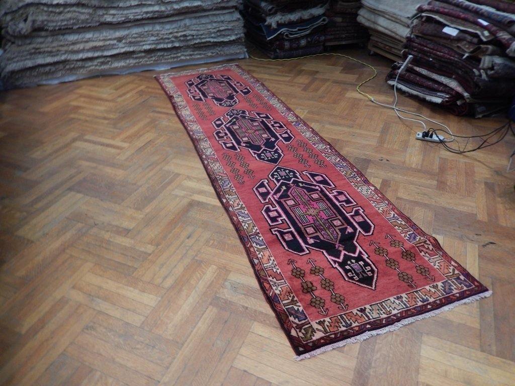 Semi-antique navy Hamadan-style runner, mid-length pattern showing tribal motifs