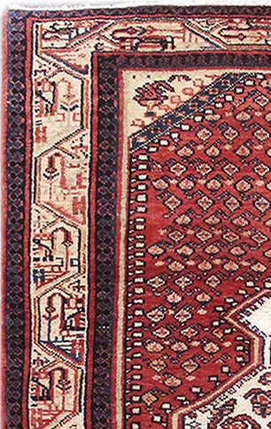 Mahal-style tribal rug, corner detail with architectural tribal geometry