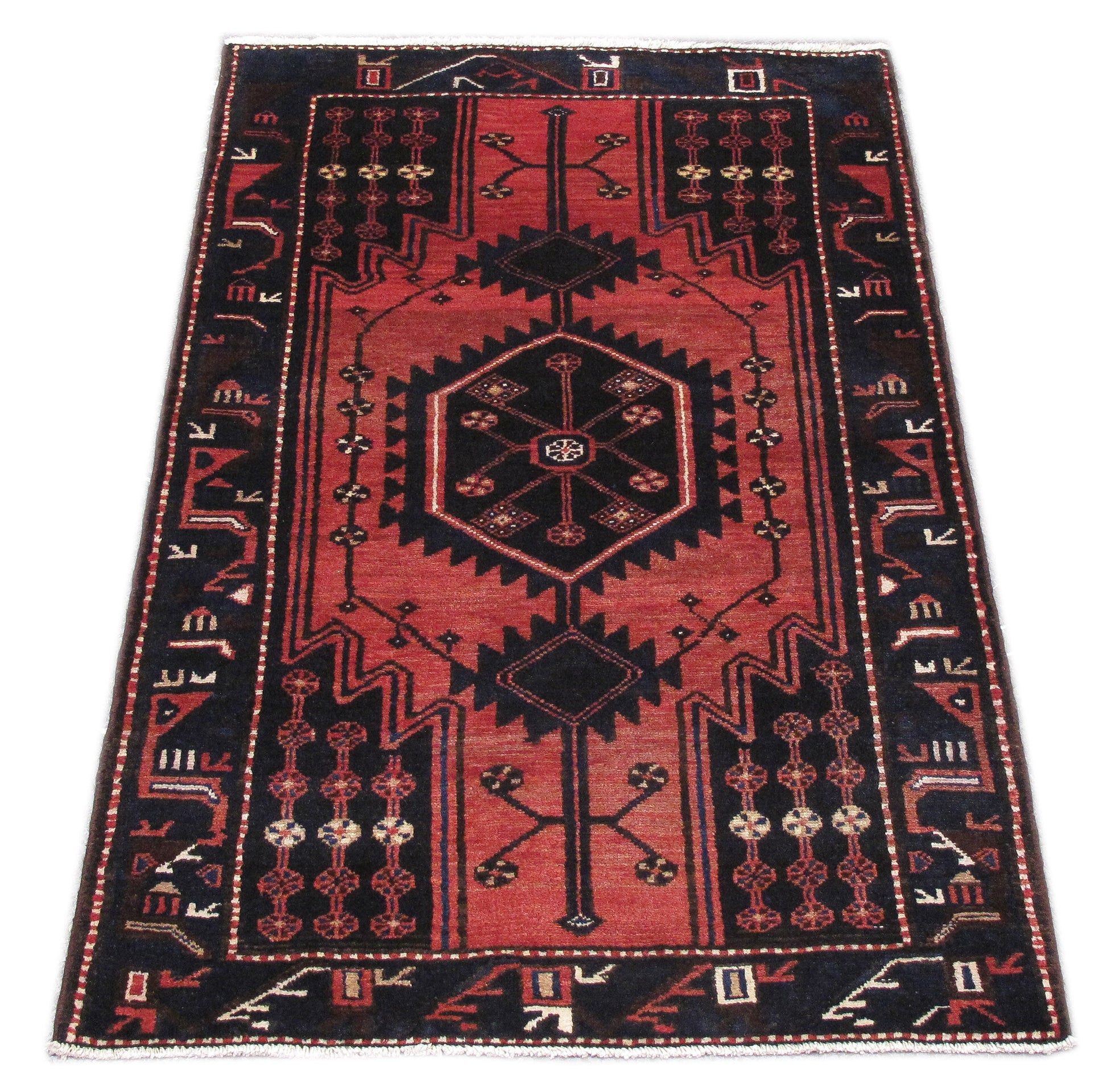 Tribal Hamadan-style small rug, central medallion close-up in ivory and navy