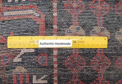 Tribal Hamadan-style small rug, pile texture and color depth close-up