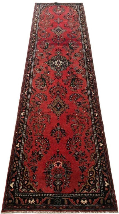 Hamadan-style long runner, central medallion detail in red and ivory