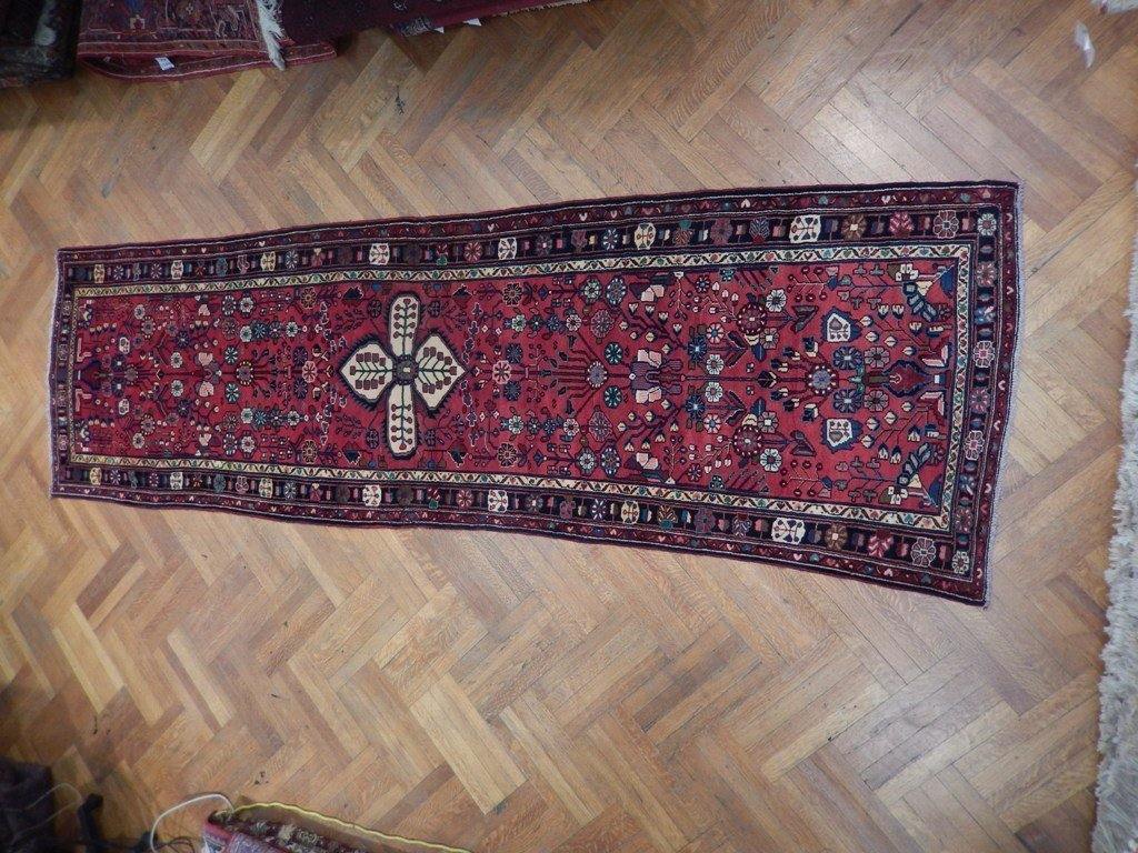 Hamadan-style floral runner, central medallion detail in red and ivory