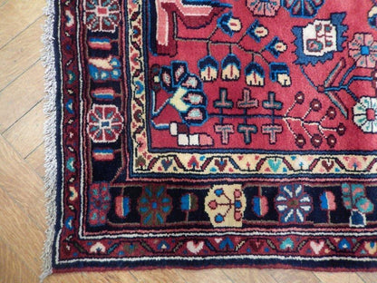 Hamadan-style floral runner, pile texture showing wool depth
