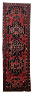 3.9 x 10 Hamadan-style hand-knotted wool runner in rust red, full length top view