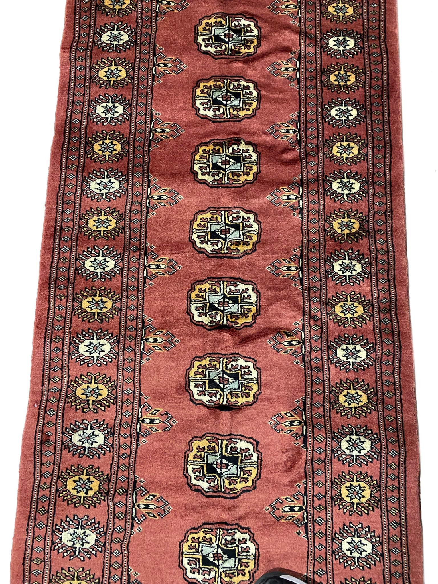 Bokhara 14-foot runner, mid-length pattern detail