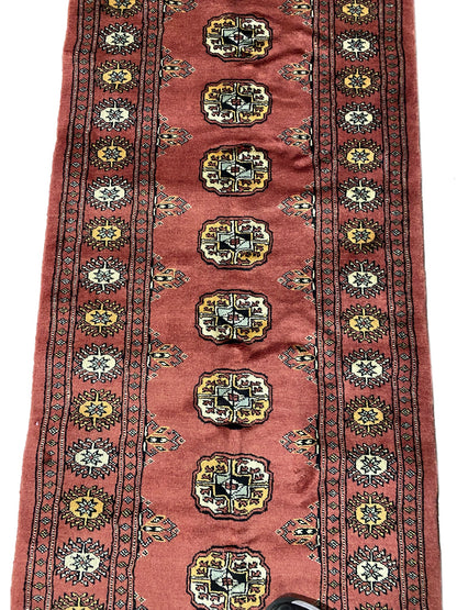 Bokhara 14-foot runner, mid-length pattern detail