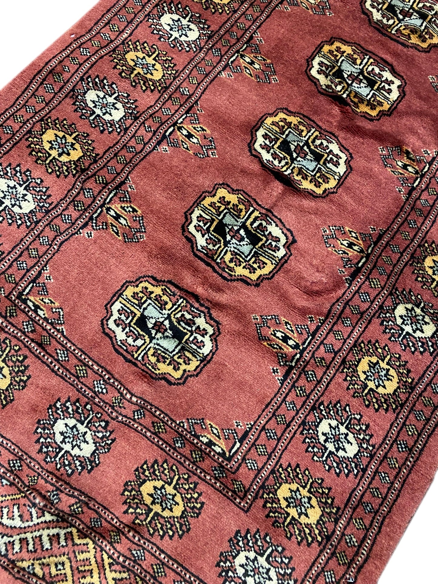 Bokhara 14-foot runner, ivory border close-up