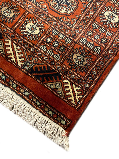 Bokhara 18-foot runner, true mid-length showing symmetry