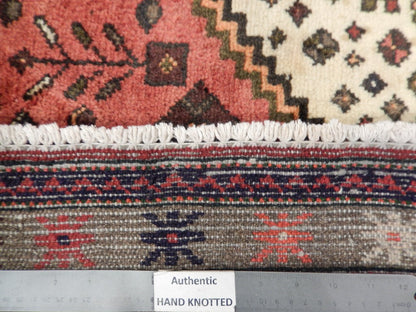 Pink Hamadan-style small rug, pile texture and color depth detail