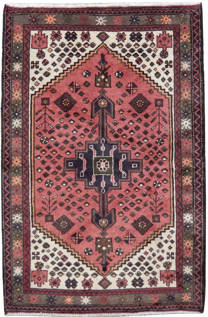 3 x 4.9 Hamadan-style hand-knotted wool rug in soft pink with geometric medallions, top view