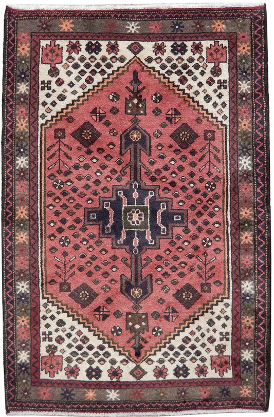 3 x 4.9 Hamadan-style hand-knotted wool rug in soft pink with geometric medallions, top view