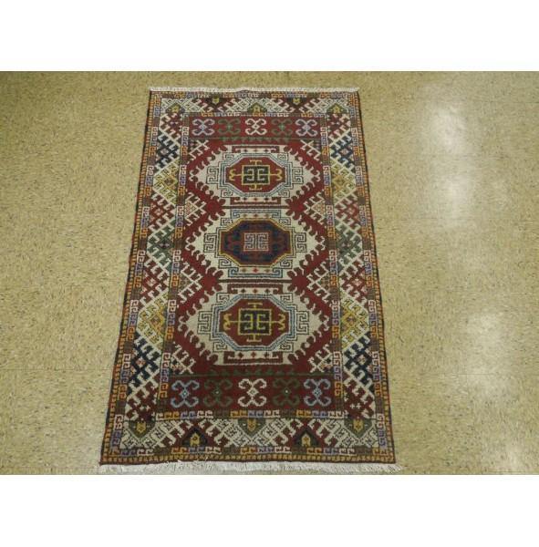 3 x 5 hand-knotted kazak wool rug, detail of pattern